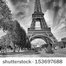 stock-photo-paris-la-tour-eiffel-summer-sunset-above-city-famous-tower-153697688.jpg